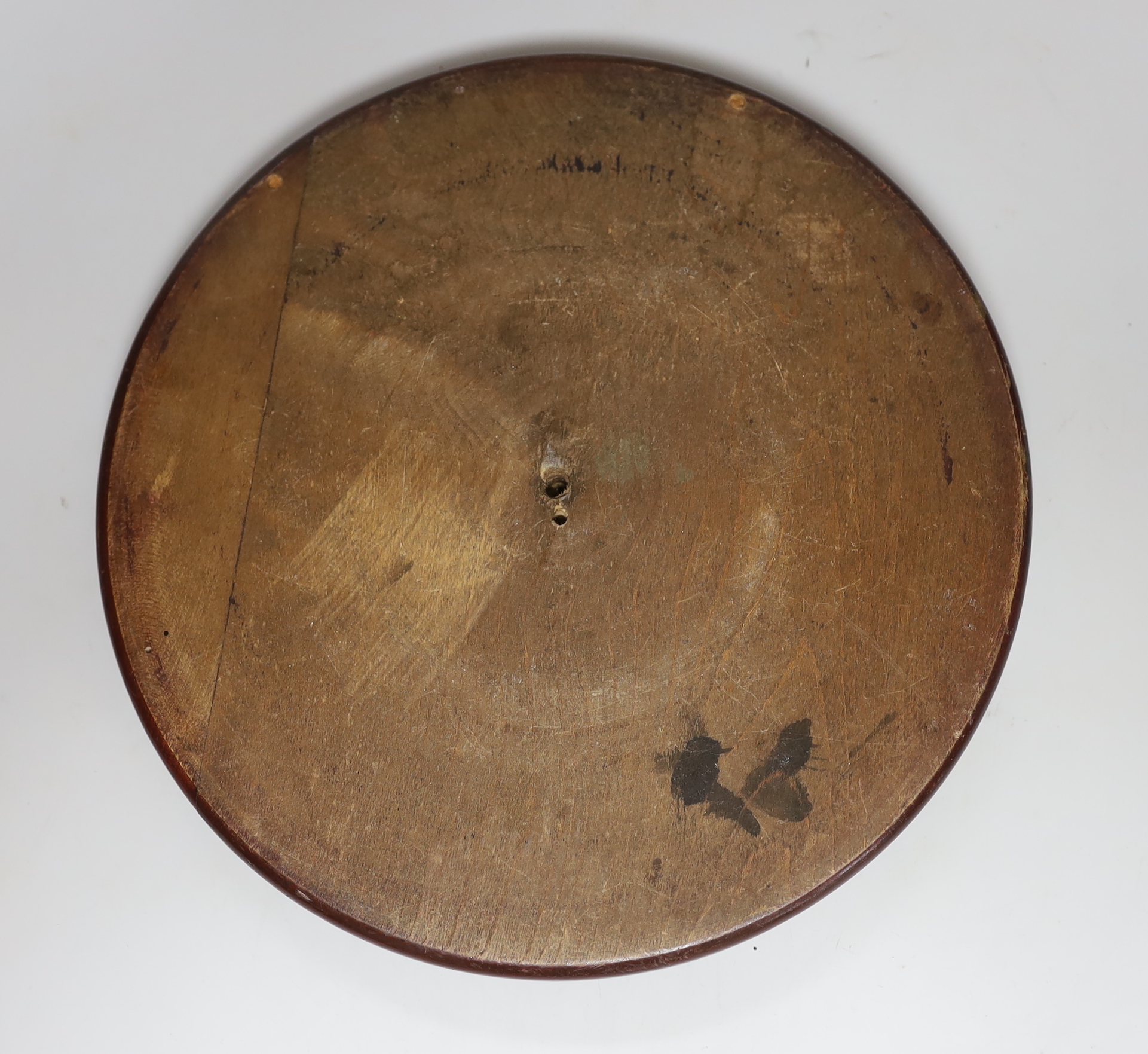 An early circular beech bagatelle board, 31cm diameter